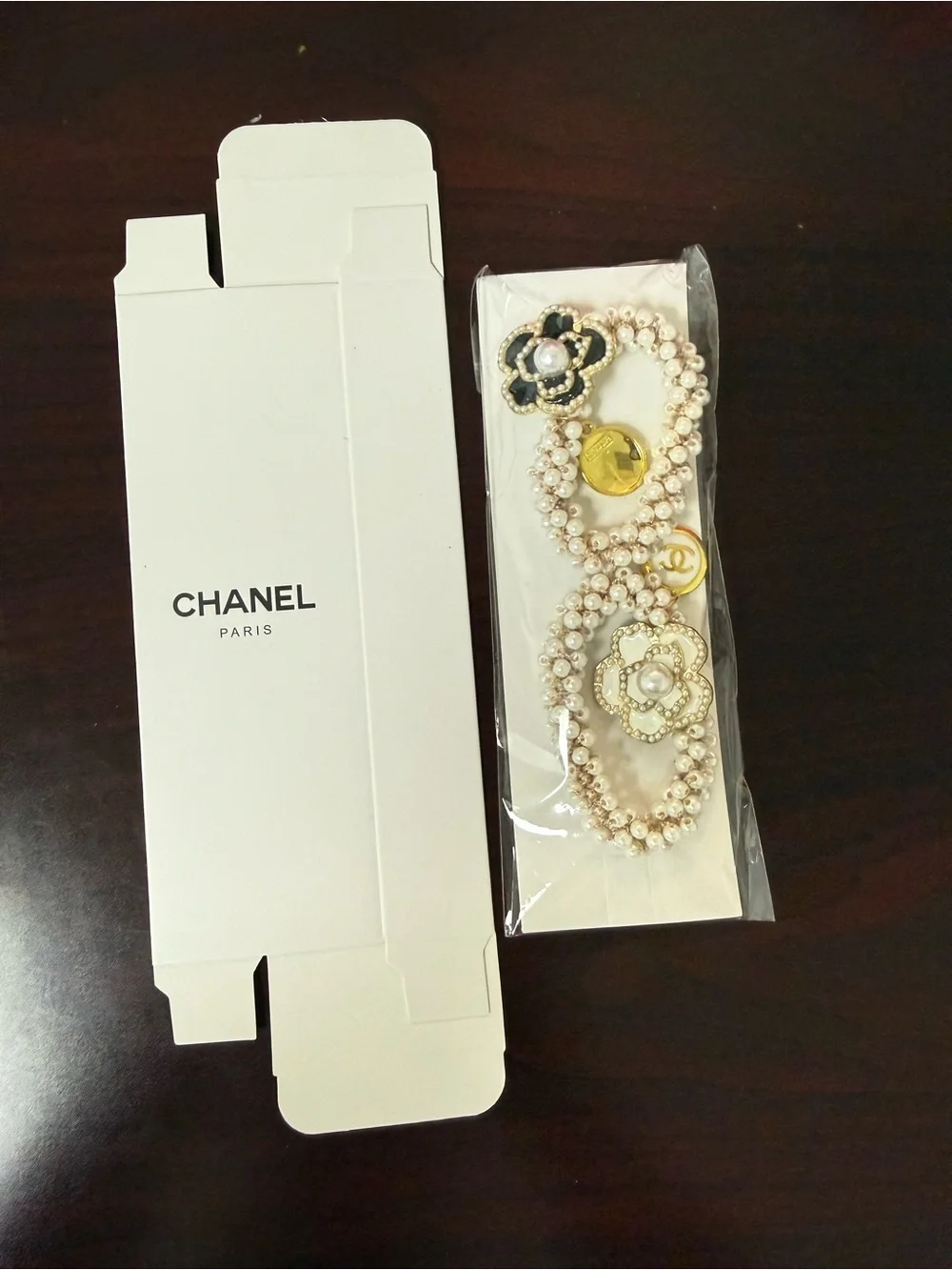 CHANEL Pearl and Camellia Brooches in Cream, Black and Gold